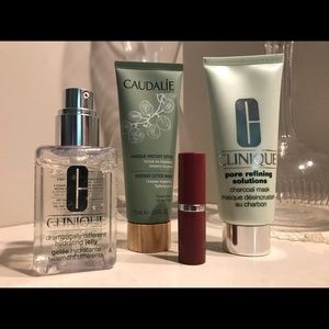 4 piece Clinique and Caudalie set with bag